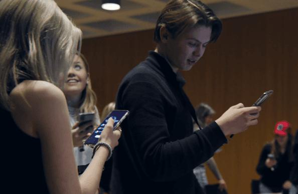 Students playing with phones