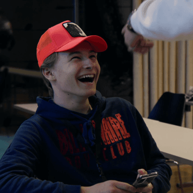 Boy student laughing